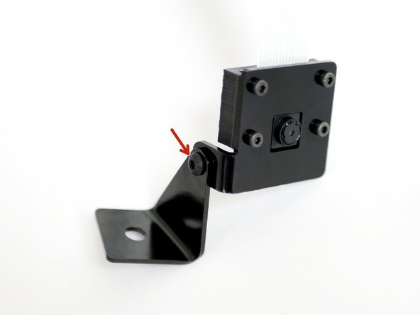 Fix the Pi Cam case assembly to the metal mounting bracket.