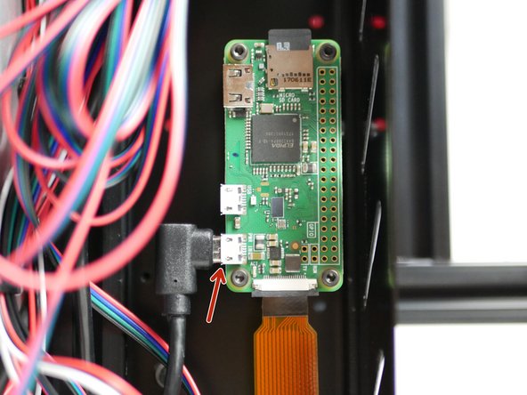 Tape the connector to the back of the power supply.