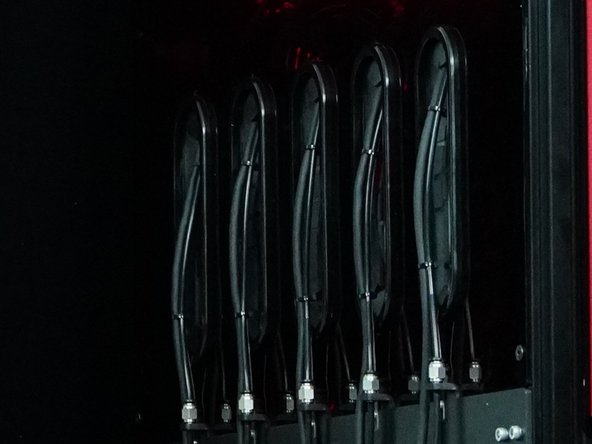 Install the two left side panels with M5x6mm bolts and M5 T-Nuts.