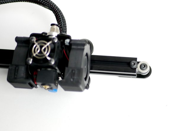 Fix an M5 x 8mm bolt with a T-Nut onto the end of the gantry beam to act a stopper for the Tool Carriage to prevent it from accidentally rolling off.