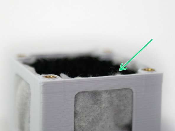 Trim away the excess HEPA cloth.