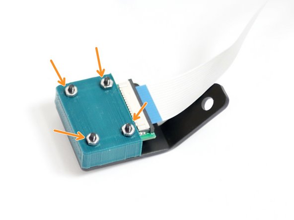 Secure the camera and the casing to the metal mounting bracket.