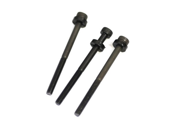 Take three M3x40mm bolts and slide onto each an M3x2mm spacer.