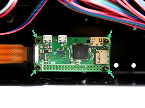 Connect the golden ribbon cable to the Raspberry Pi with the black side up. Push the black bar back in to lock the cable into the connector.