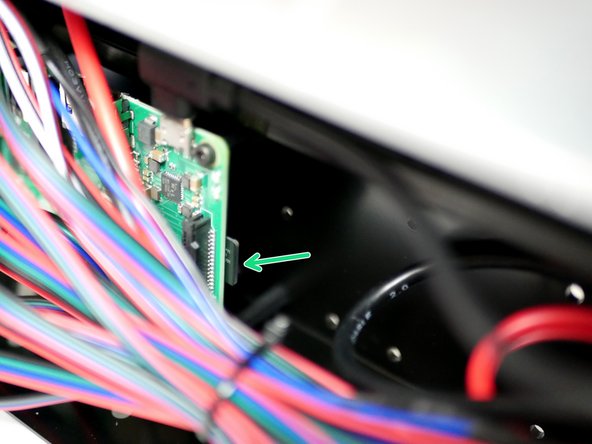 On the Pi 3 B+ it is inserted into the back of the board with the golden contacts facing up. You may find it easier to unscrew the board from the mounts to gain better access.