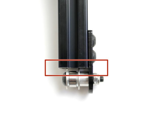 Make sure that the 15mm washers are pressing against the end of the beam.