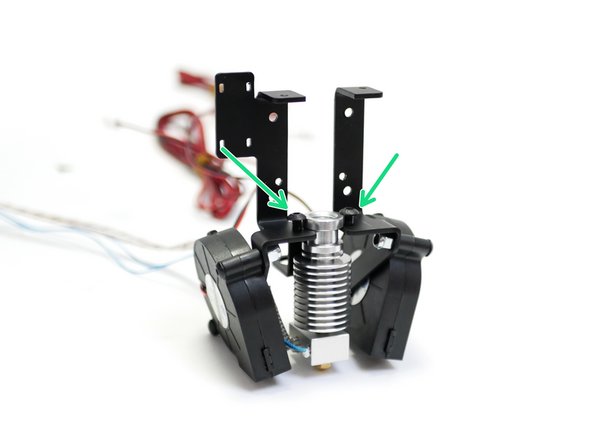 Fix the Hotend to the Mount with two M4 x 8mm button bolts.