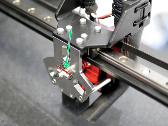 Re-install the servo with the locking mechanism.