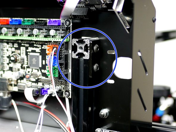 Fix an extrusion bracket with two M5 x 8mm bolts and M5 T-Nuts onto the bottom of the 2020x500mm beam connecting it to the 2020x360mm beam under the base.