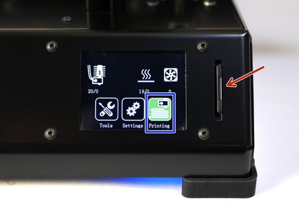 Insert the SD card into the printer.