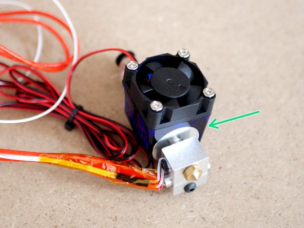 With everything assembled you can clip the fan back on.