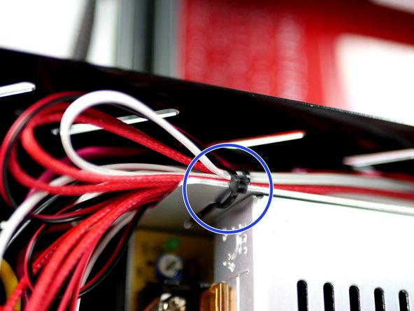 Cable tie the cables to the power supply to hold in place.