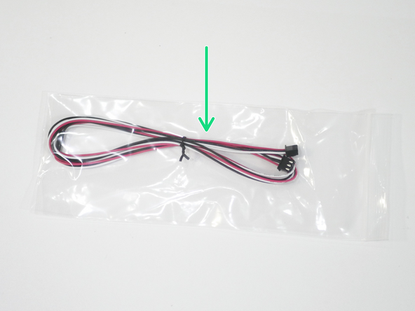 The calibration probe cable is a 1M long, 3 wire (red, white and black) cable that has a connector on either end.
