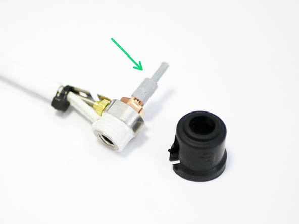 Apply a thin layer of the included thermal paste to the shaft of the hotend heatbreak as shown.
