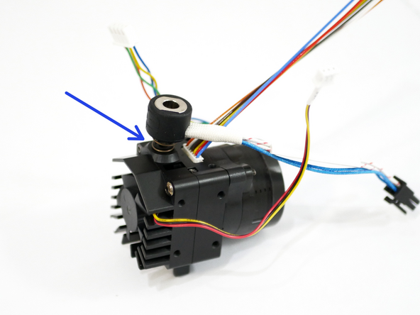 Orientate its cables so that they point to the corner of the motor as shown.