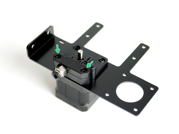 Fix the Coupling Bracket onto the motor with two M3 x 18mm cap head bolts.