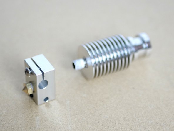 Fix the Heatsink assembly to the Heater Block assembly.