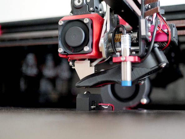 Check the probe position by moving the first print head directly over it.