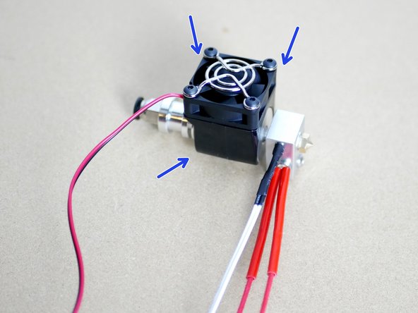 Snap the heatsink fan assembly onto the heat shink as shown in the first image.