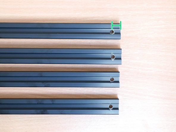 Each hole should be drilled 10mm from the edge.