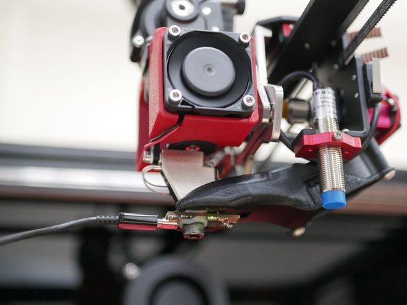 Home the printer and select a print head - if you've already done an offset calibration then use one of the print heads other than the first one, as then you can re-check the calibration for just that one. (Remember, offsets are relative to the first print head).