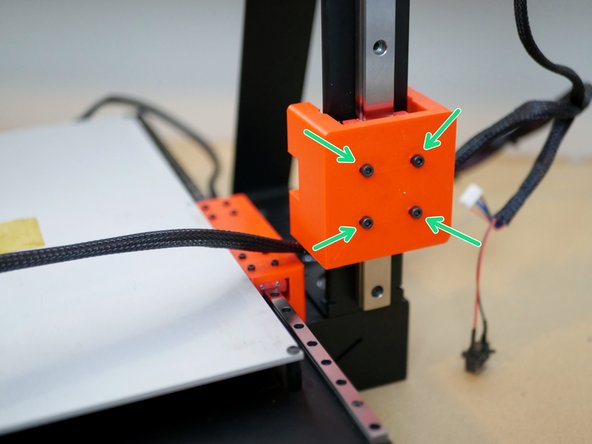 Fix the gantry carriage to the Z-Rail as shown with four M3 x 8mm cap head bolts.