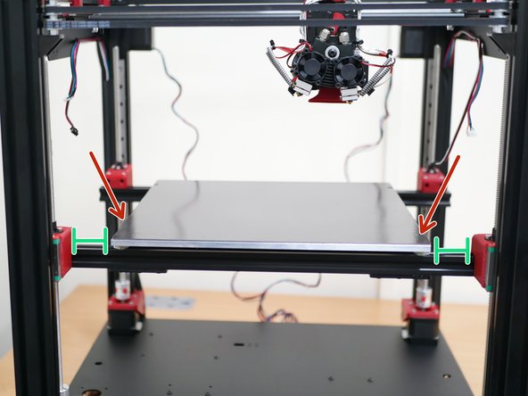 With the platform still able to slide left and right, adjust its position so that it lines up to the centre of the printer.
