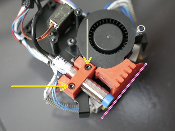 Remove the nuts and washers from the probe and fix the probe to the mount, again with two M3 x 6mm bolts.