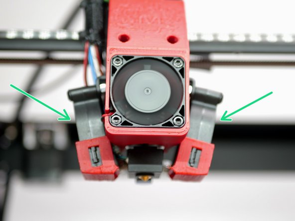 Both part cooling fans should be spinning.