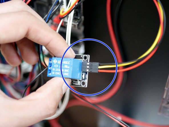 Connect the single connector sides of the cable to the relay switch in the order shown.