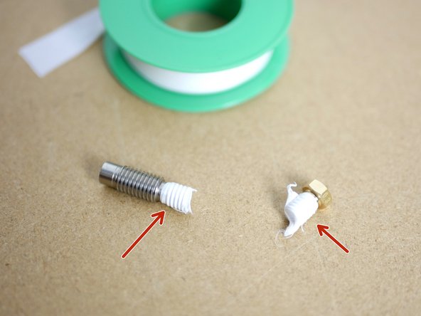 Wrap several layers of the PTFE Thread Tape around the threads of the Throat and Nozzle as shown in the image.
