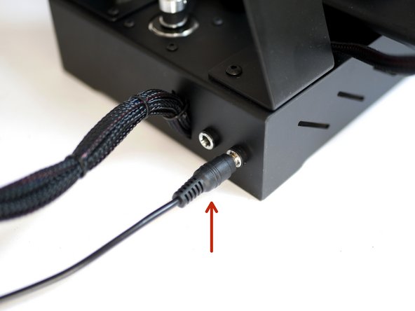 Once the firmware has completed uploading, connect the AXIS to the mains.