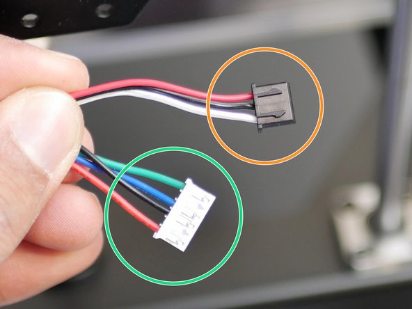 Route the cables down the 2040 extrusion as shown. Use electrical tape to cover the cables.