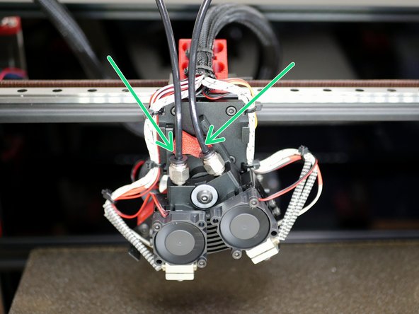 Re-insert the PTFE tubes into the hotend and extruder couplings.