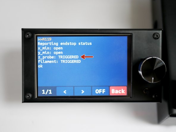 With the metal object still under the probe, send the M119 command again, and it should return as TRIGGERED.