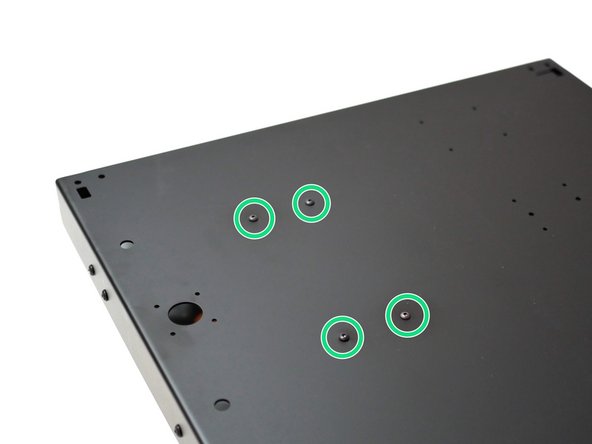 Fix the PSU to the base with four M4 x 6mm button head bolts.