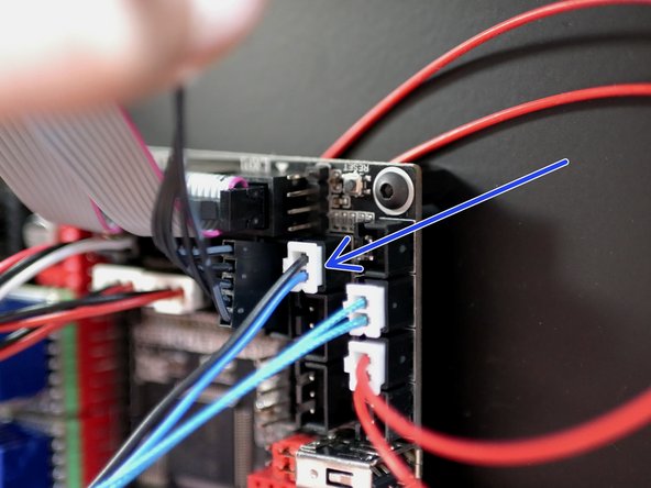 Connect the black and blue cable from the probe to the control board in the position shown.