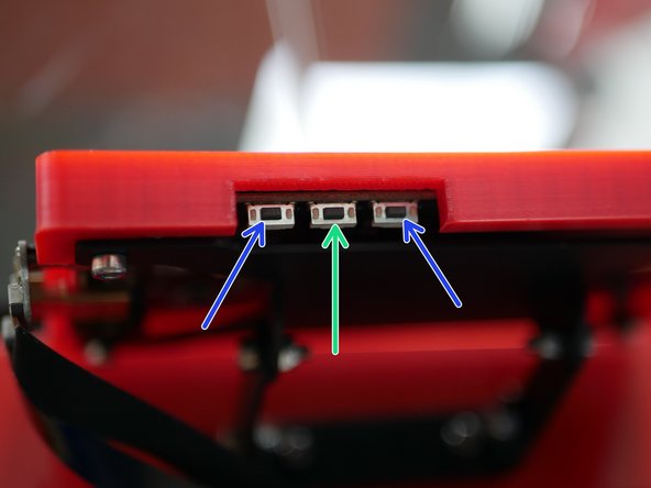 There are three buttons underneath the display on the edge.