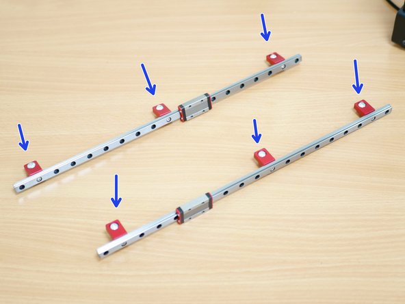 Fix to each of the rails 3 of the aluminium mounts as shown with M3 x 6mm bolts.