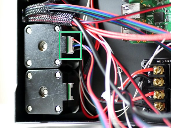 Plug one end into the X-motor.