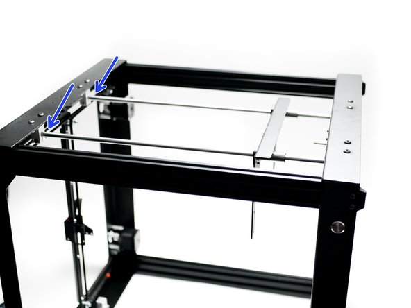 Push the shafts all the way up into the brackets on the top panel.