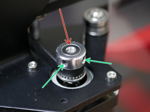 With the belts tensioned manually move the tool carriage around to allow the pulley heights to settle into position.