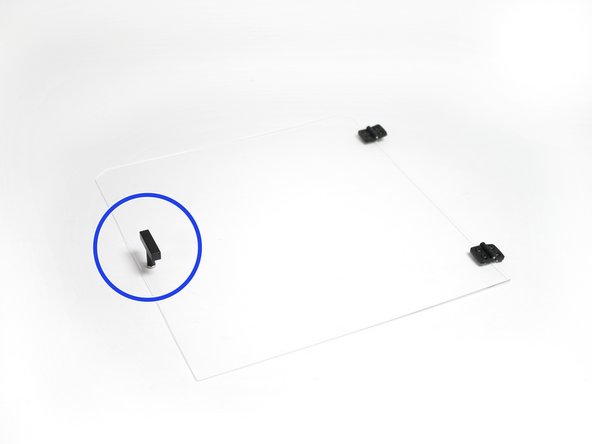 Fix the handle onto the front panel.