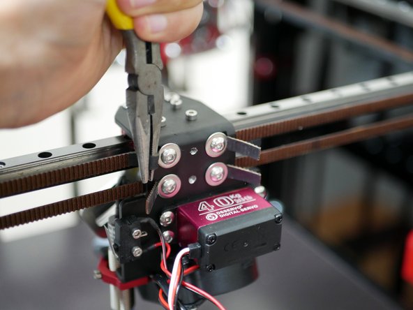 Use the included pair of plies to tension the belts.