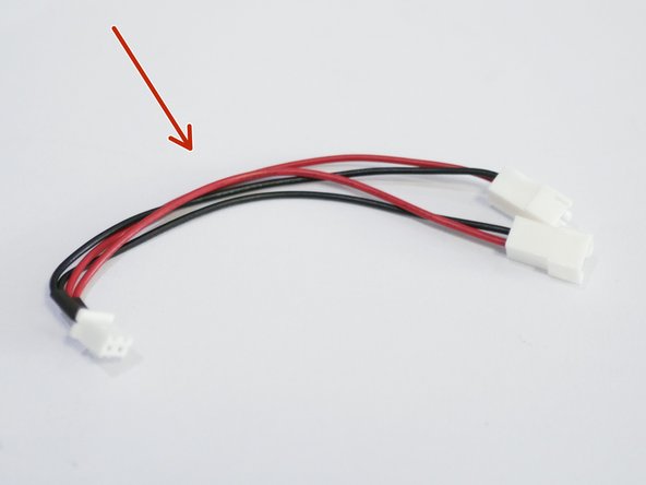 Connect the fan splitter to the control board.