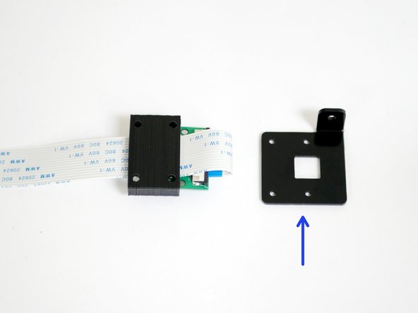Fix the Pi Camera to the metal casing with: