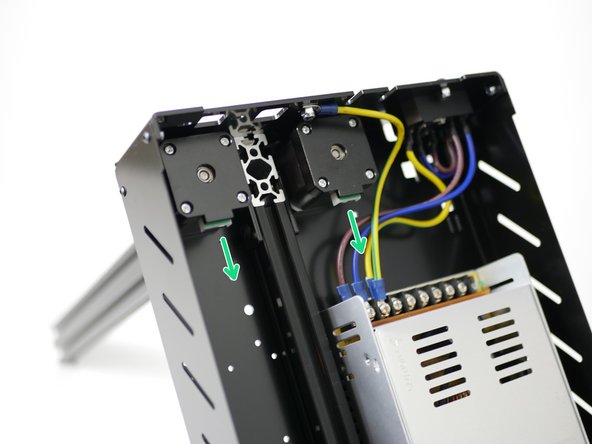 Install two NEMA 17 motors to the Base; orientate the cable ports towards the front of the base.