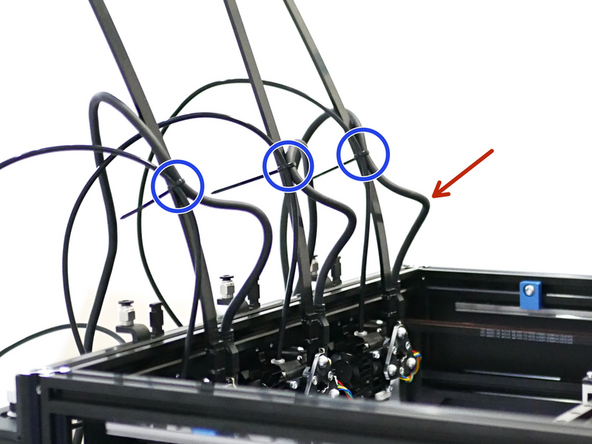 Push the PTFE tubing into the extruder.