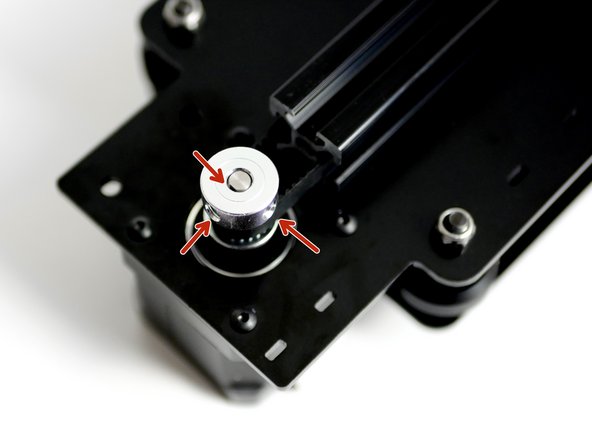 Secure the pulley by tightening the set screws