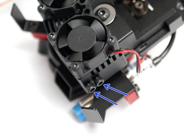 With the heater block assemblies pushed in all the way, tighten the bolts to secure them in place.